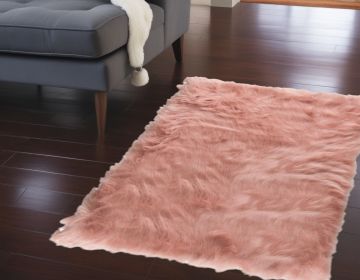 24" X 36" X 1.5" Dusty Rose Plush Faux Sheepskin Area Rug