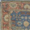 5' x 7' Blue and Beige Floral Hand Woven Distressed Area Rug